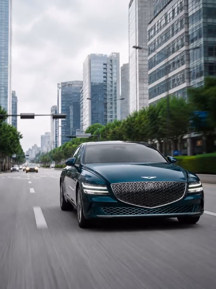 Cinematic car driving through a modern city